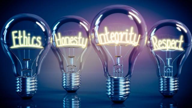 Ethics, honesty, integrity, respect - shining four light bulbs - 3D illustration