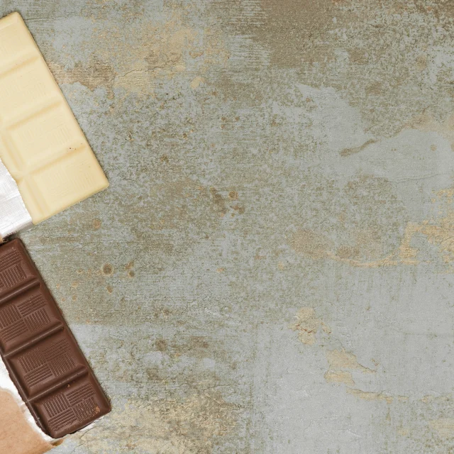 barre-de-chocolat-au-lait-et-noir-sur-fond-grunge-1.jpg